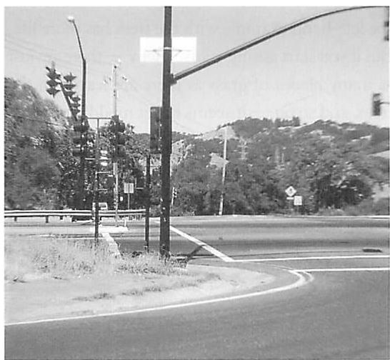 Suburban road with traffic lights