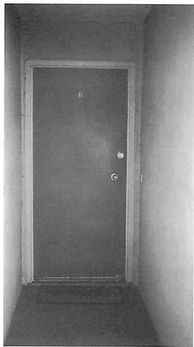 Motel door made of plywood. This door has very few centers.