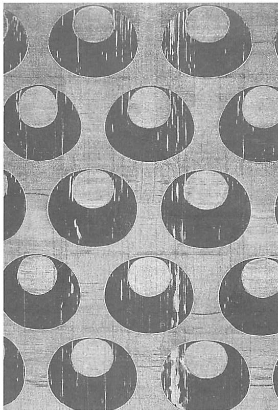 Ottoman velvet: here, the circles are used to magnificent effect, in a way which uses the good shape of the circle, to create powerful centers. This is at the opposite extreme, artistically, from the triviality of the Copenhagen Police Headquarters building. The circles, the portion of circle left in the larger circle, and the spaces between the circles are all calculated to be beautiful and powerful elementary shapes in their own right.