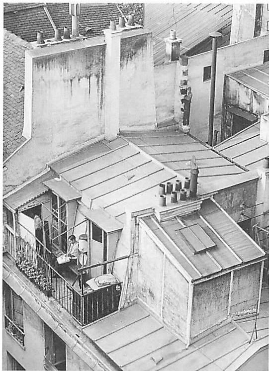 Eking out a bit of afternoon sun on a tiny rooftop flat