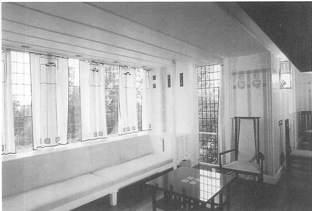 A beautiful center formed by the light of a window, as a major part of an important room. In this case, this is where the room's life comes from.